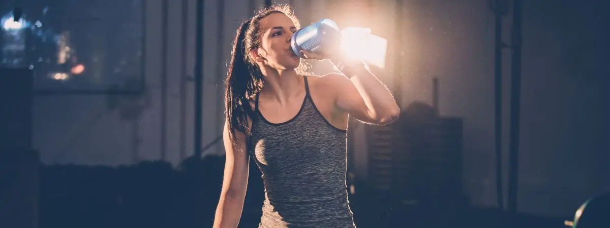 Best Gallon Water Bottle - Woman drinking water